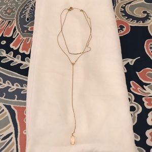 Beautiful long necklace with white gem
